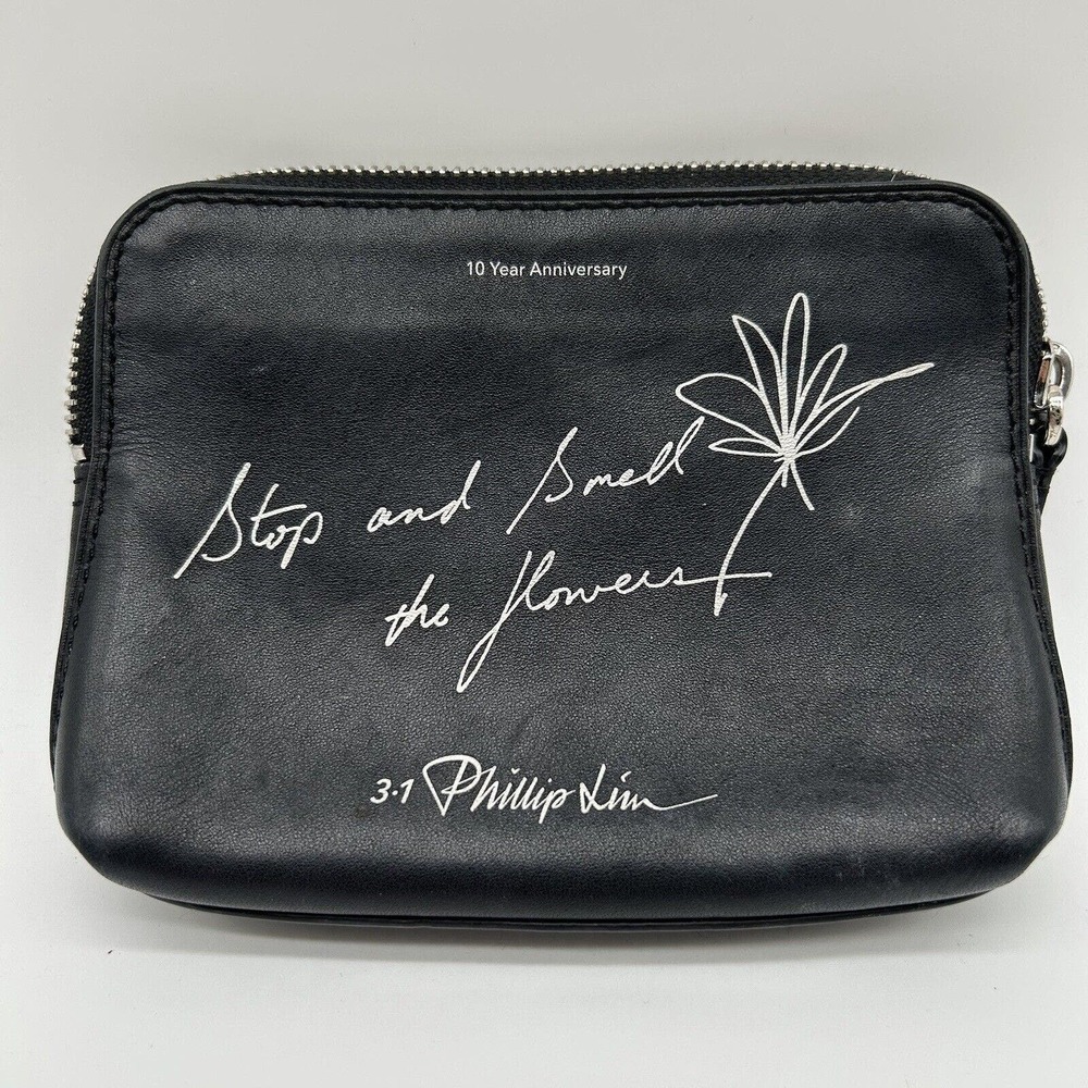 Phillip Lim Authentic black leather make-up bag “Stop and smell the flowers”